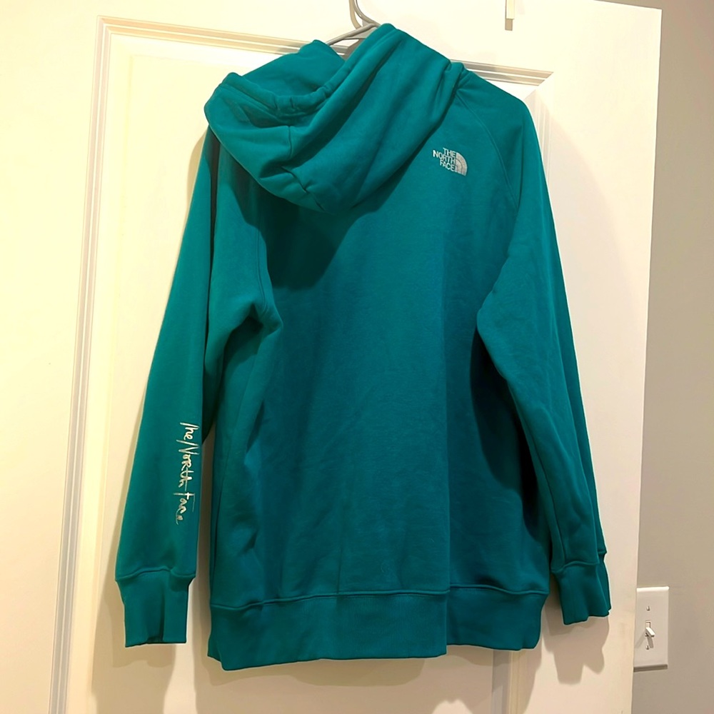 The North Face teal green hooded sweatshirt; never worn; nwot